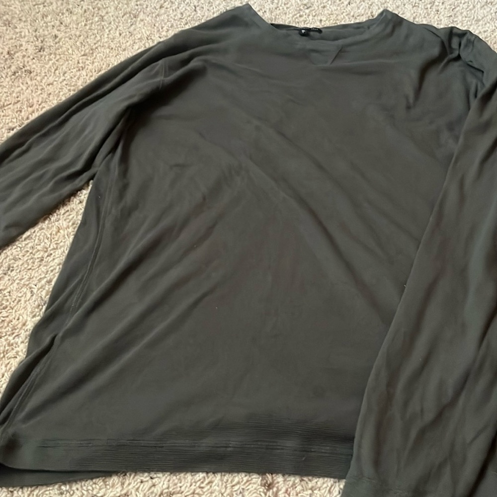 Brand is American tall, XL, dark green